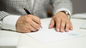 man, sign, paper